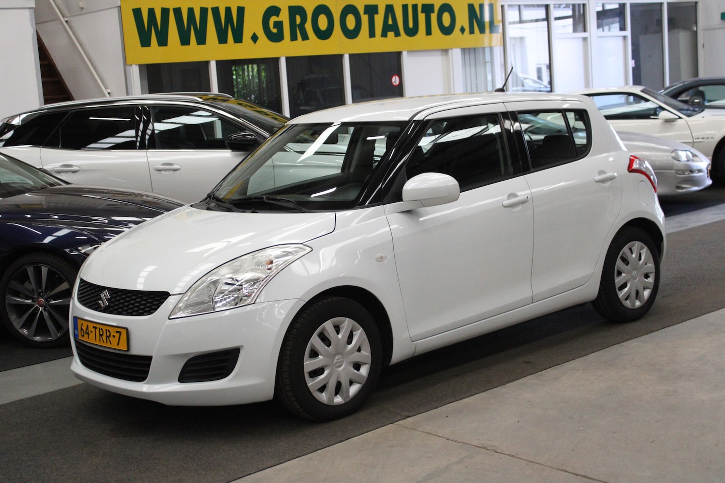 Suzuki Swift - 1.2 Comfort EASSS 35.636km NAP, Airco, Isofix, Stoelverwarming - AutoWereld.nl