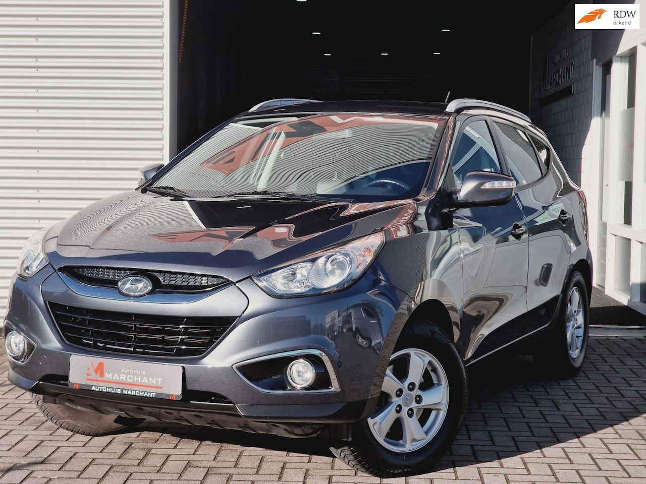 Hyundai ix35 - 2.0i Style 1e Eig|Trekhaak|PDC|Stoelverw|Keyless - AutoWereld.nl