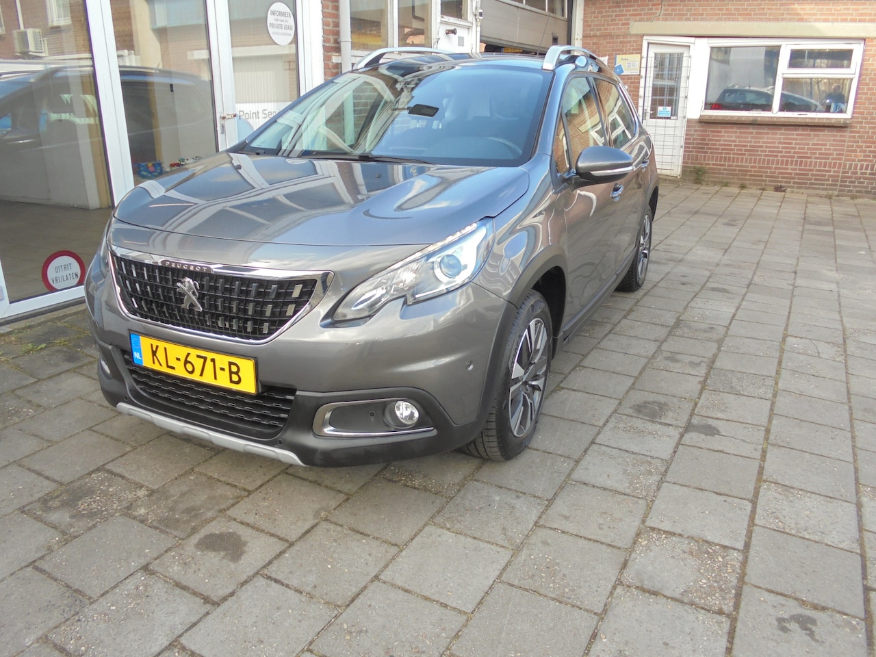 Peugeot 2008 - 1.2 PureTech Allure Automaat, Navigatie Plus, Cruise, Airco,  Achteruitrijcamera, Boordcom - AutoWereld.nl