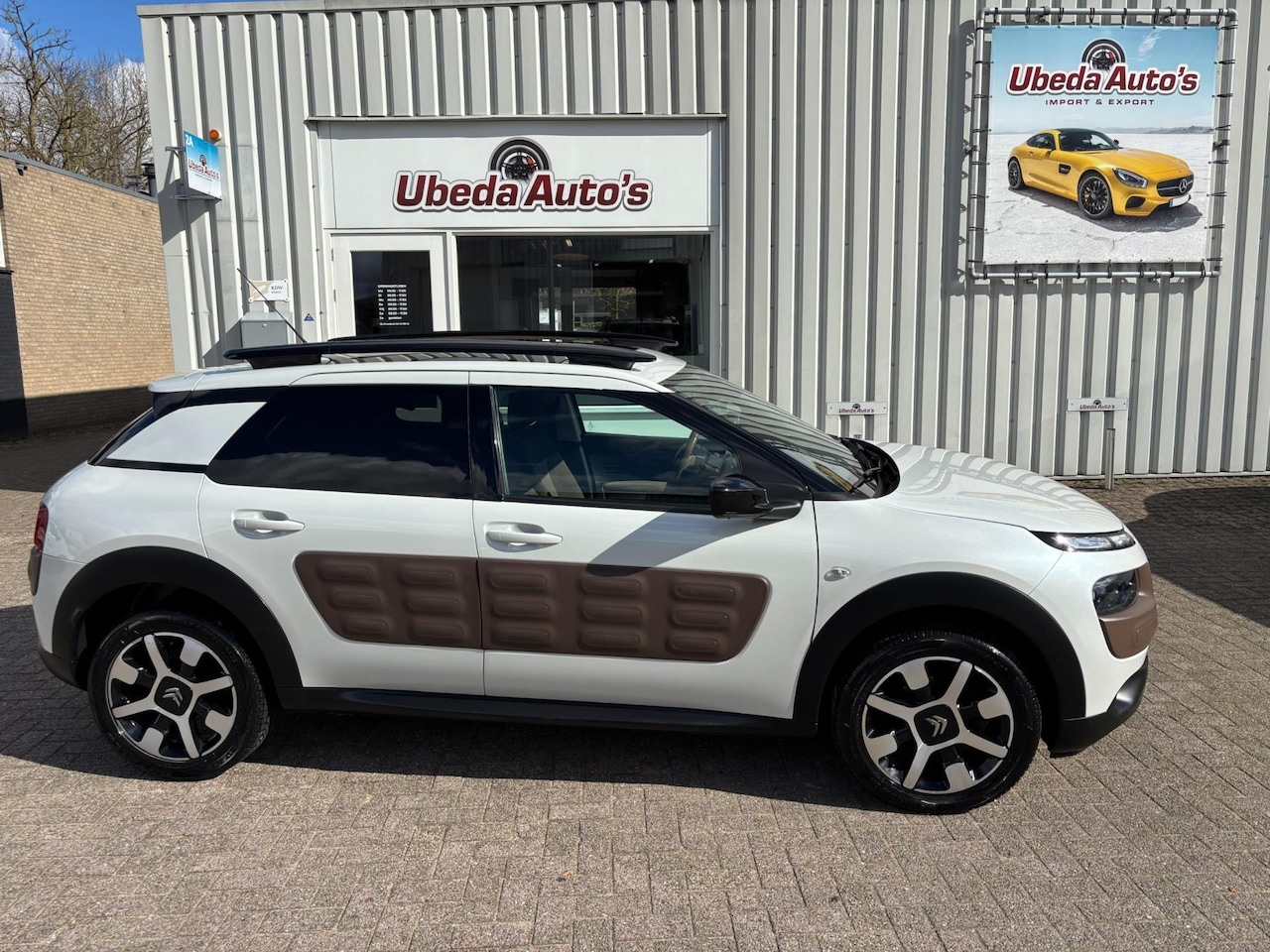 Citroën C4 Cactus - 1.2 PureTech Shine NL AUTO KM 107740 8999E - AutoWereld.nl