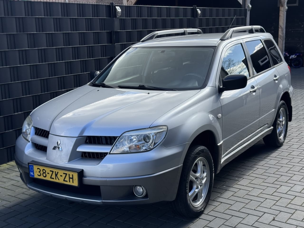 Mitsubishi Outlander Sport - 2.0 Invite+| HOGE INSTAP| AIRCO| TREKHAAK| NAVI| NAP - AutoWereld.nl