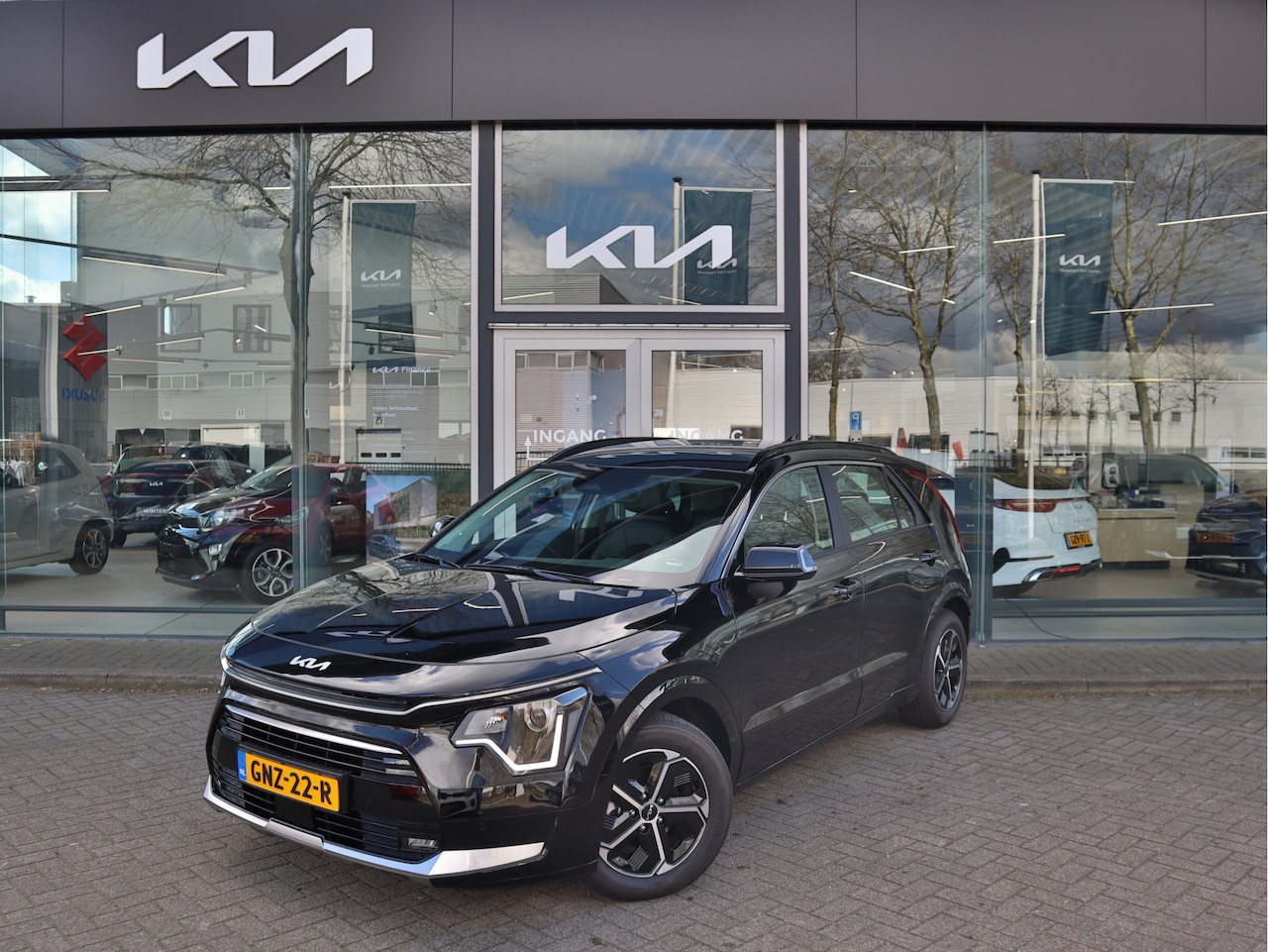 Kia Niro - 1.6 GDi Hybrid DynamicLine Navi+BT+Cam Cr. Control PDC Stoel+Stuurverw. tot 10 jr. Garanti - AutoWereld.nl