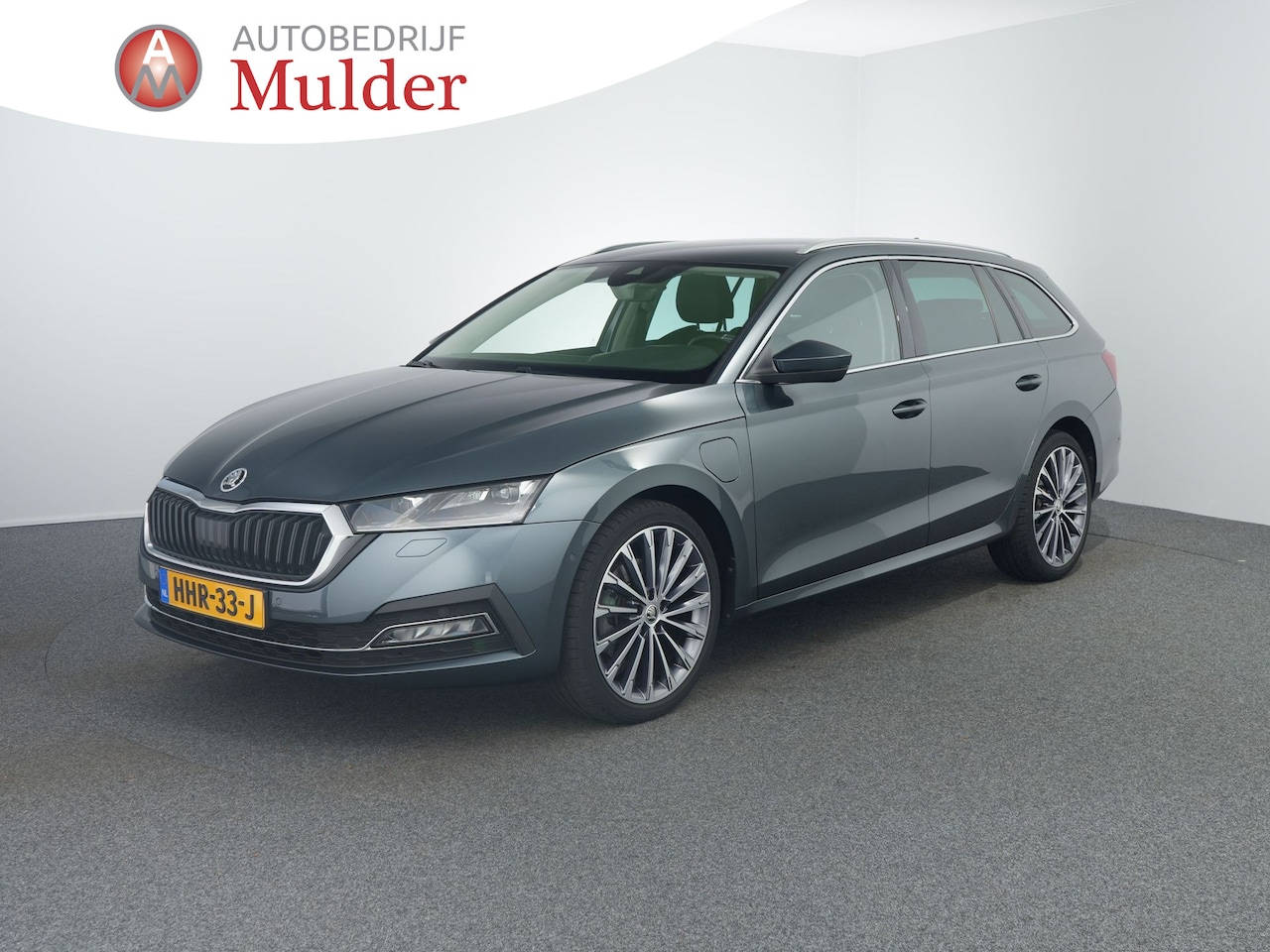 Skoda Octavia Combi - 1.4 TSI iV PHEV Business Edition Plus | Leer | Head-up | Stoelkoeling | 19"|  Winterpakket - AutoWereld.nl