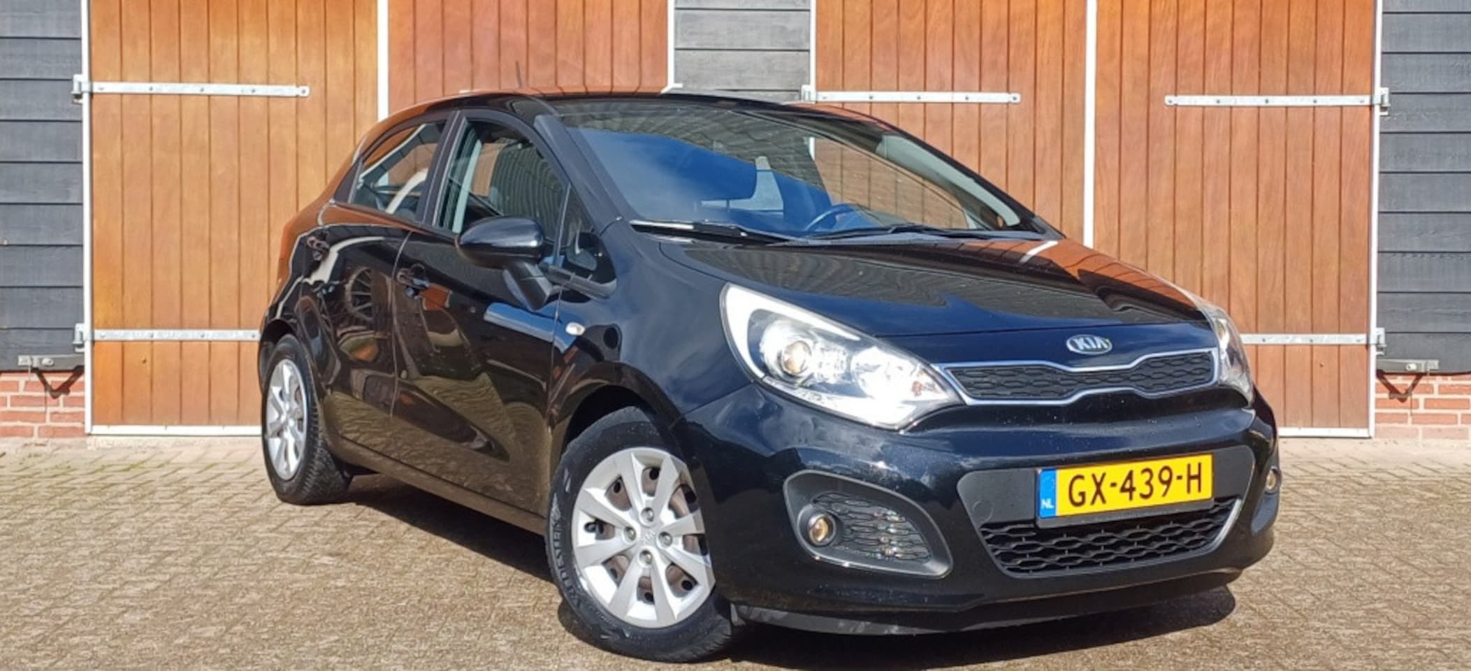 Kia Rio - 1.2 CVVT BusinessL, Bluetooth, Cruise controle, NAP, 5 deurs - AutoWereld.nl