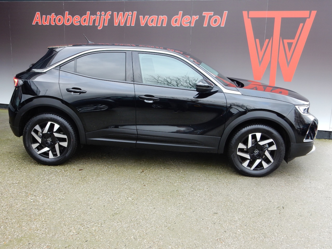 Opel Mokka - 1.2 TURBO ELEGANCE | AUTOMAAT | CARPLAY | CAMERA | HALF-LEER | ALL-SEASON!! - AutoWereld.nl