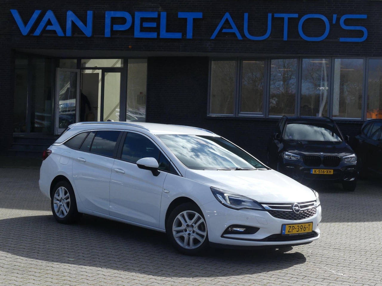 Opel Astra Sports Tourer - 1.0 Turbo Business Executive / Carplay / ECC / Camera - AutoWereld.nl