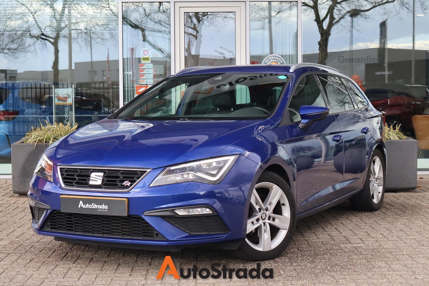 Seat Leon Sportstourer - 1.5 FR TSI 130PK | LED | Stoelverwarming | Navi | Carplay | Cruise | Beats | Camera | Virt - AutoWereld.nl