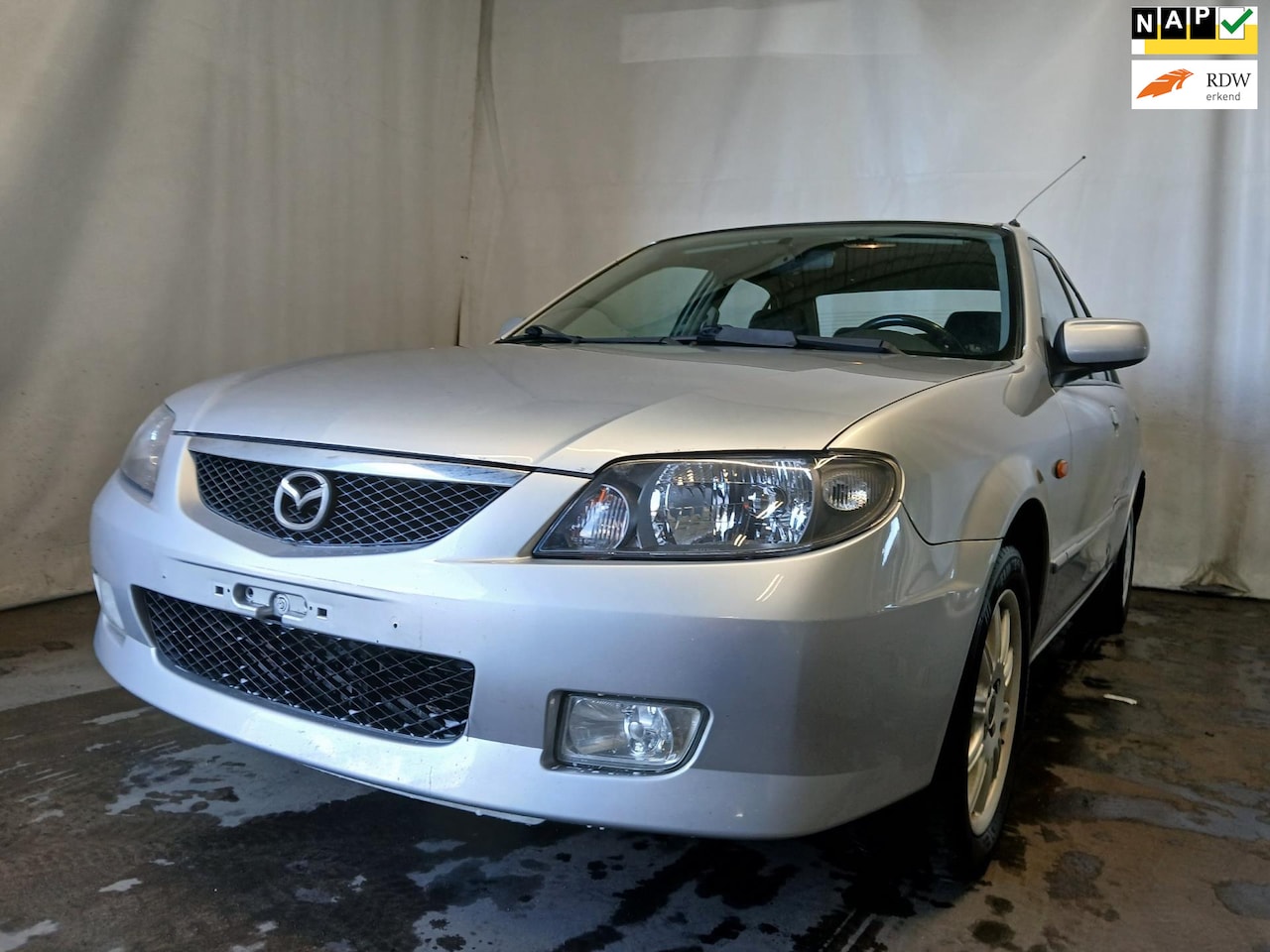 Mazda 323 - 1.6i Exclusive - Airco - Schade - AutoWereld.nl