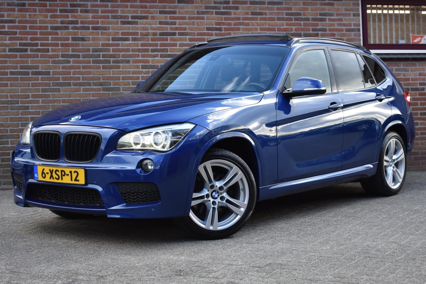 BMW X1 - XDrive28i High Executive '14 Pano Xenon Leder Clima M Pakket Navi Cruise - AutoWereld.nl