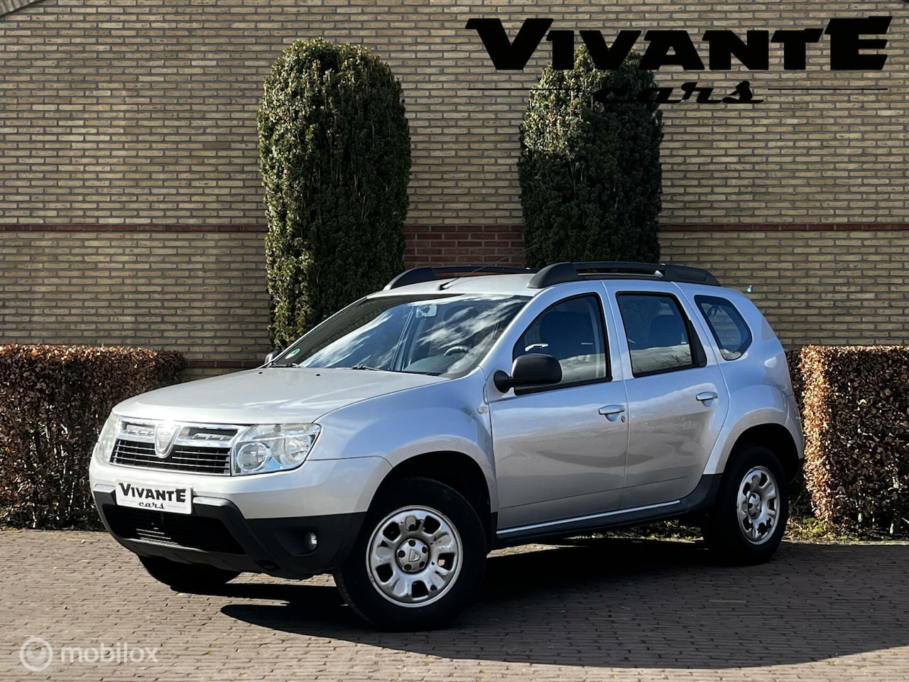 Dacia Duster - 1.6 Lauréate 2wd NAP | Airco | Elk. Ramen - AutoWereld.nl