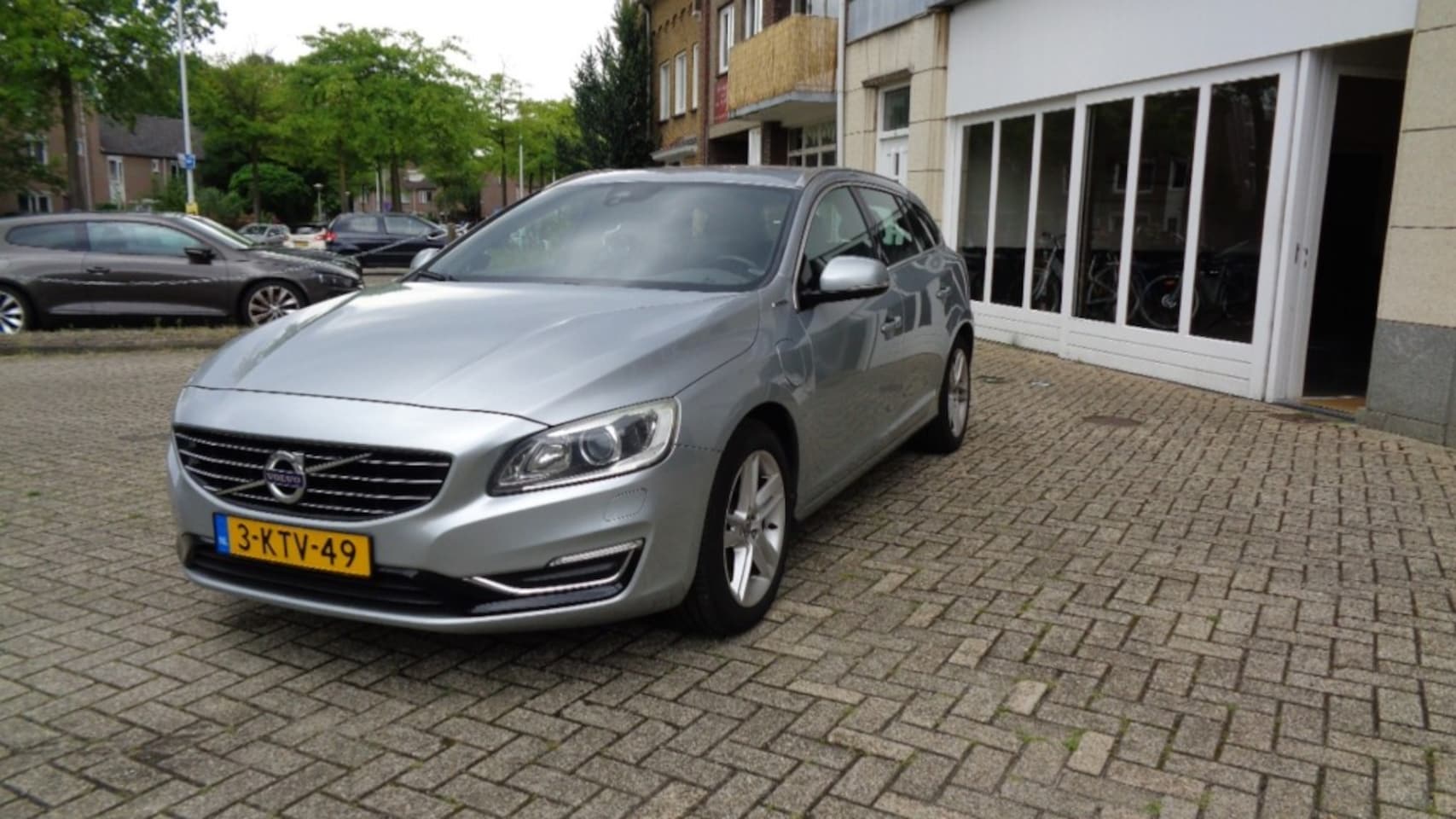 Volvo V60 - 2.4 D6 AWD  SUMMUM HYBRIDE. - AutoWereld.nl