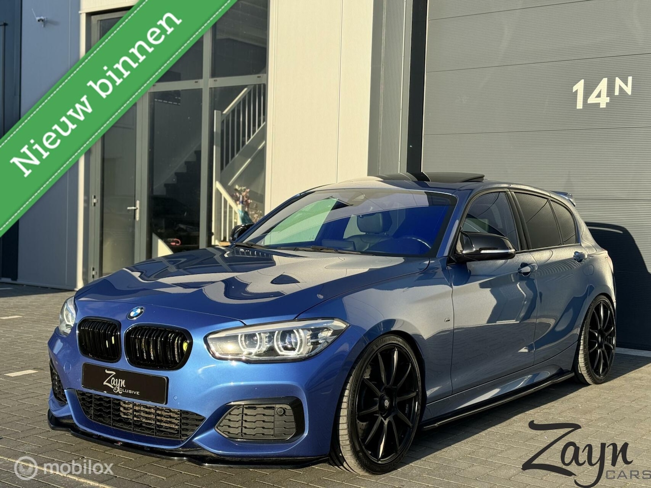 BMW 1-serie - M140i Centennial High Executive | Dak | Maxton | - AutoWereld.nl