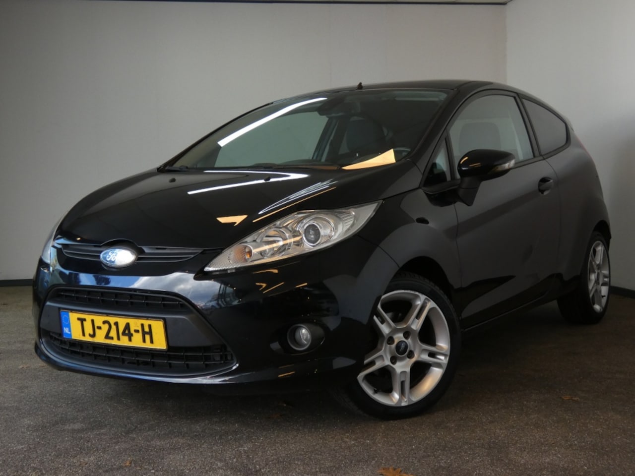 Ford Fiesta - 1.4 Ghia 1.4 Ghia - AutoWereld.nl