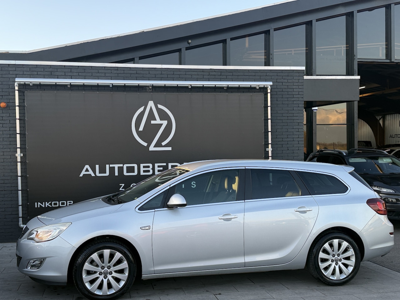 Opel Astra Sports Tourer - 1.4 Turbo Cosmo Compleet opel dealer dekker onderhouden !! - AutoWereld.nl