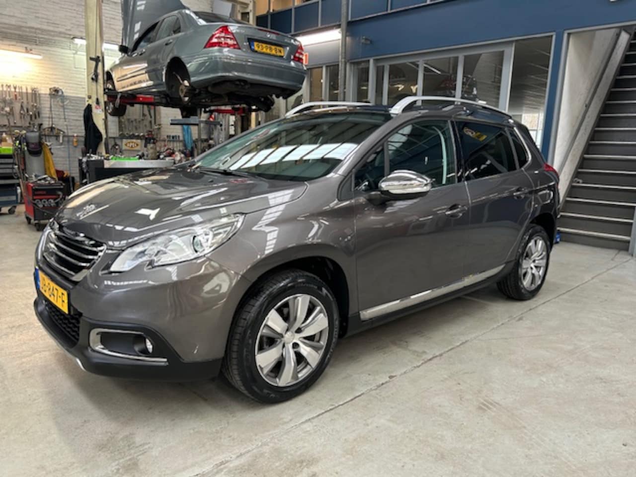 Peugeot 2008 - 1.2 PureTech 82pk Allure | Navigatie | Climate control | Panoramadak | Cruise control | Pa - AutoWereld.nl