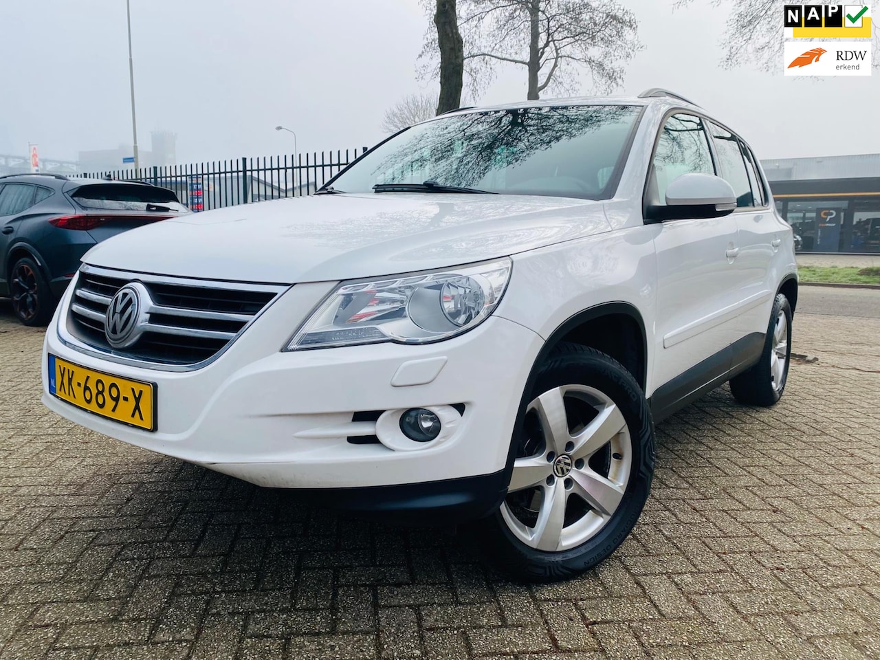 Volkswagen Tiguan - 1.4 TSI Highline 4Motion Pano Pdc Navi Tel Cruise - AutoWereld.nl