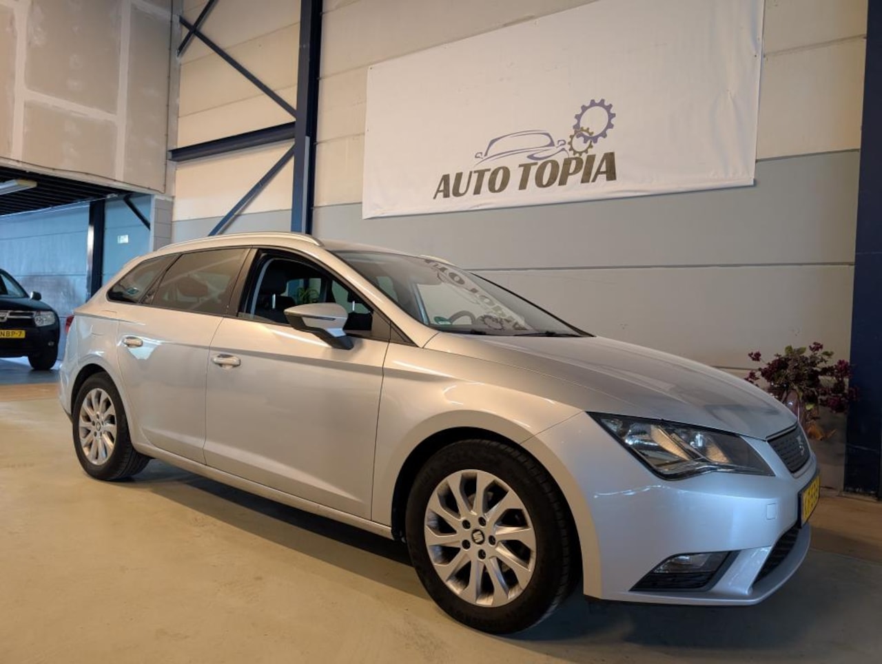 Seat Leon ST - 1.0 EcoTSI Style Connect *Clima - Navi - Carplay* - AutoWereld.nl