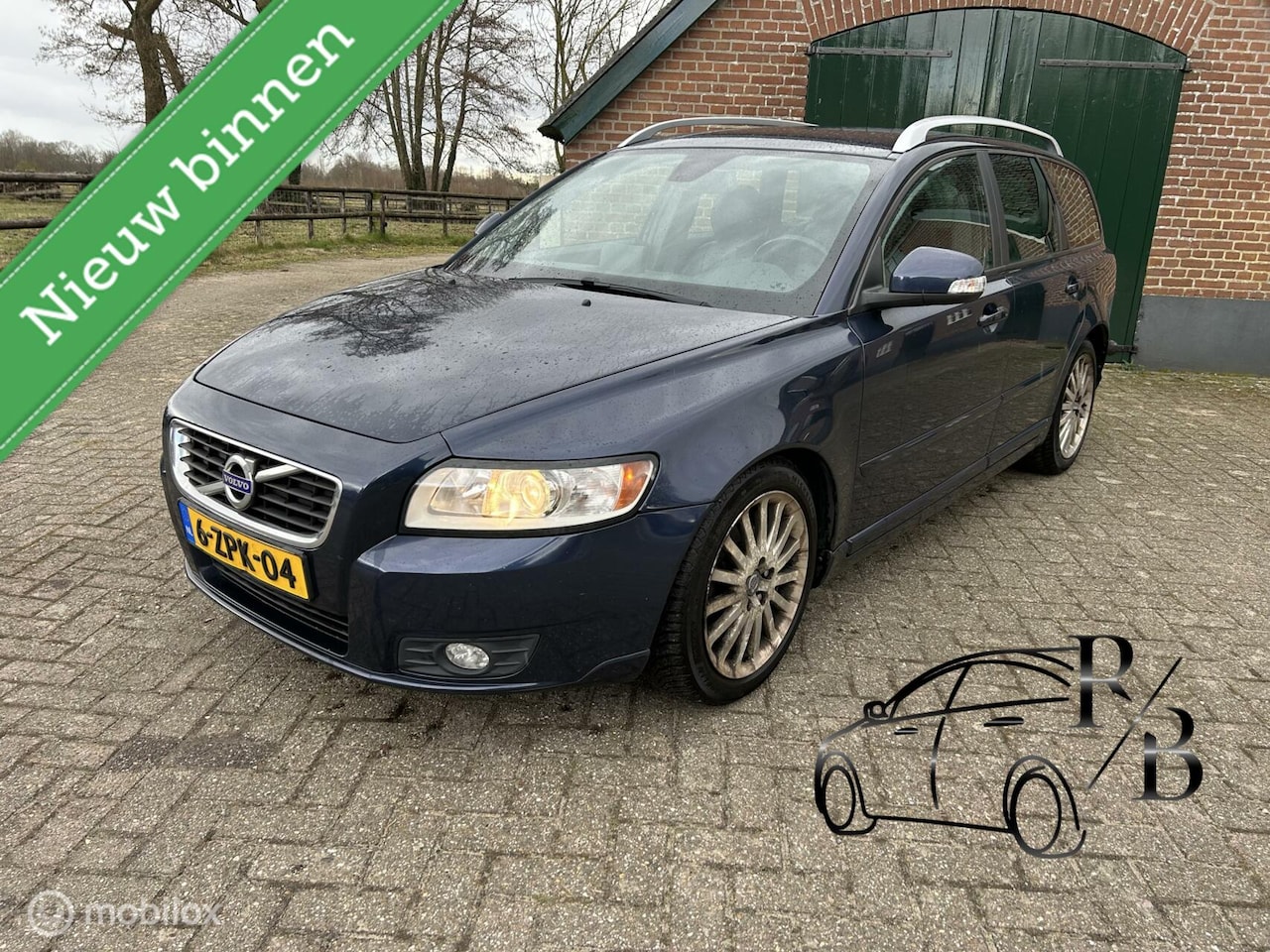 Volvo V50 - 1.6 D2 S/S R-Design Pro Edition LEER/NAVI/STOELVERW/TREKHAAK - AutoWereld.nl