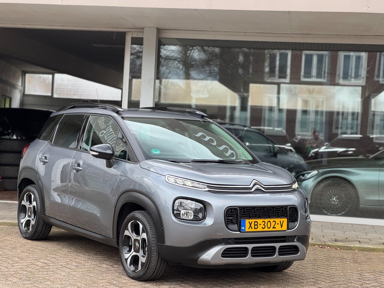 Citroën C3 Aircross - 1.2 PureTech S&S Shine|1e Eigenaar|Origineel NL|Camera|Trekhaak|Nieuwstaat|CarPlay|Nav - AutoWereld.nl