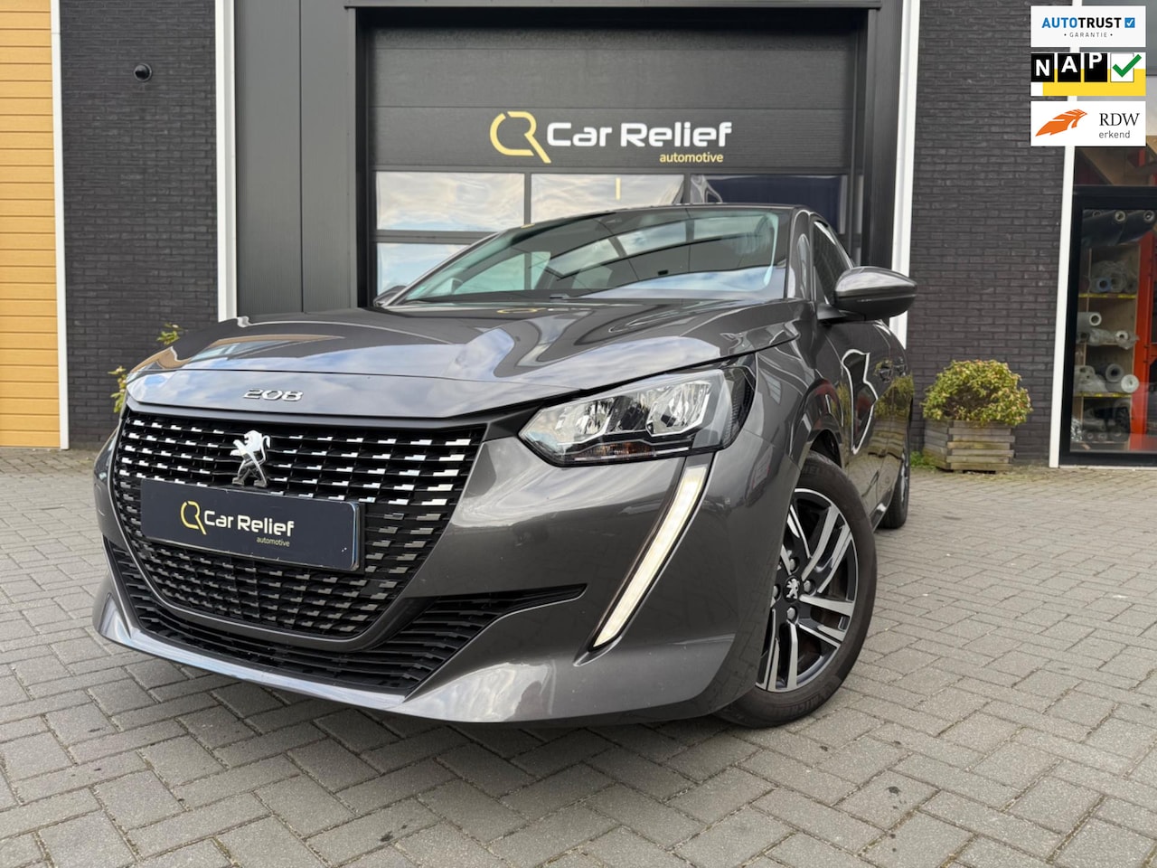 Peugeot 208 - 1.2 PureTech Allure Pack 1.2 PureTech Allure Pack, Parkeercamera, Apple CarPlay, Lane Assist, Cruise Control, Keyle - AutoWereld.nl