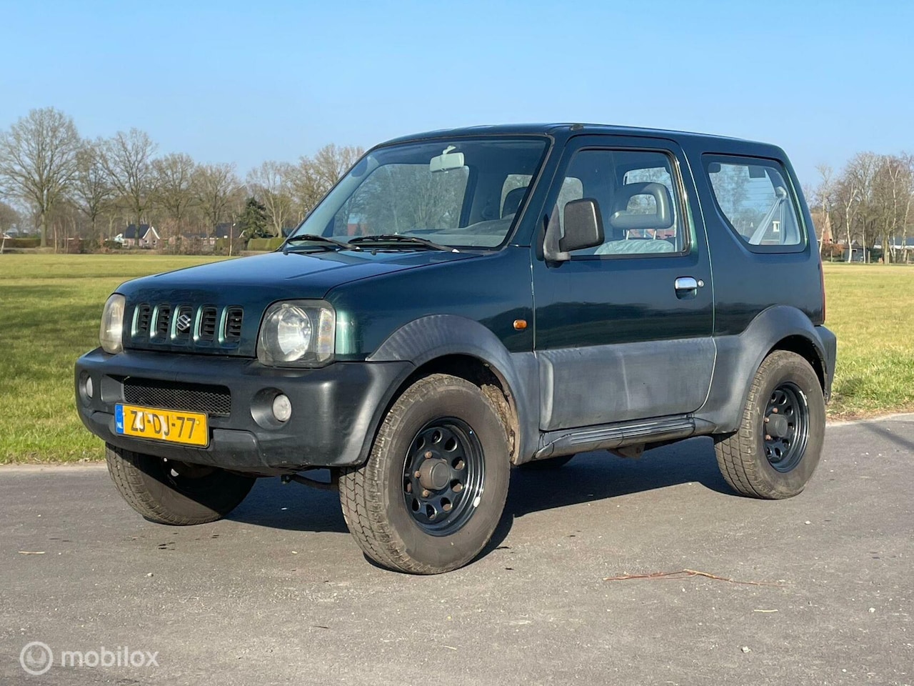 Suzuki Jimny - 1.3 JX 2WD 1.3 JX 2WD - AutoWereld.nl