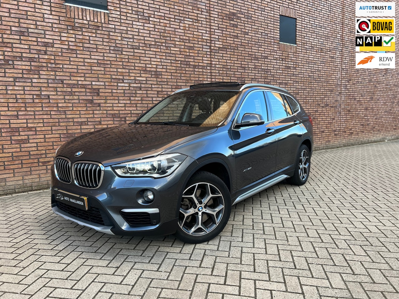 BMW X1 - XDrive20i High Executive PANO-HUD - AutoWereld.nl