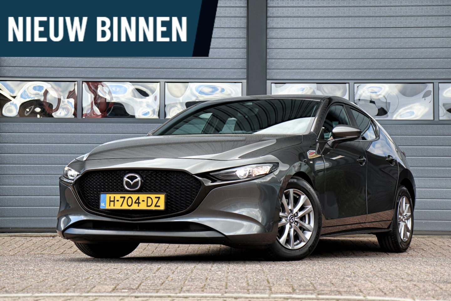 Mazda 3 - 2.0 e-SkyActiv-G M Hybrid 122 /LED/HEAD-UP/ACC/NAVI/PDC/CARPLAY! - AutoWereld.nl