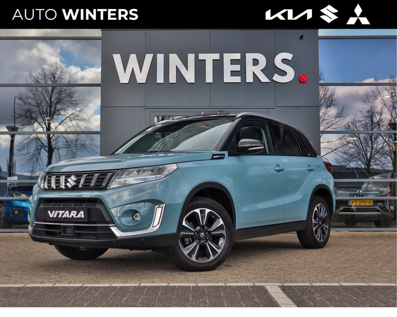 Suzuki Vitara - 1.5 Hybrid Style Navi+BT+Camera+Carplay Stoelverwarming ECC-Airco Cr.Control 17"LMV - AutoWereld.nl