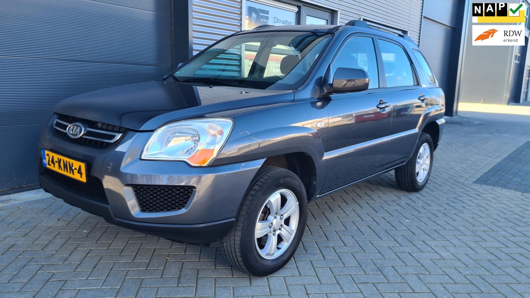 Kia Sportage - 2.0 CVVT X-pect 2.0 CVVT X-pect - AutoWereld.nl