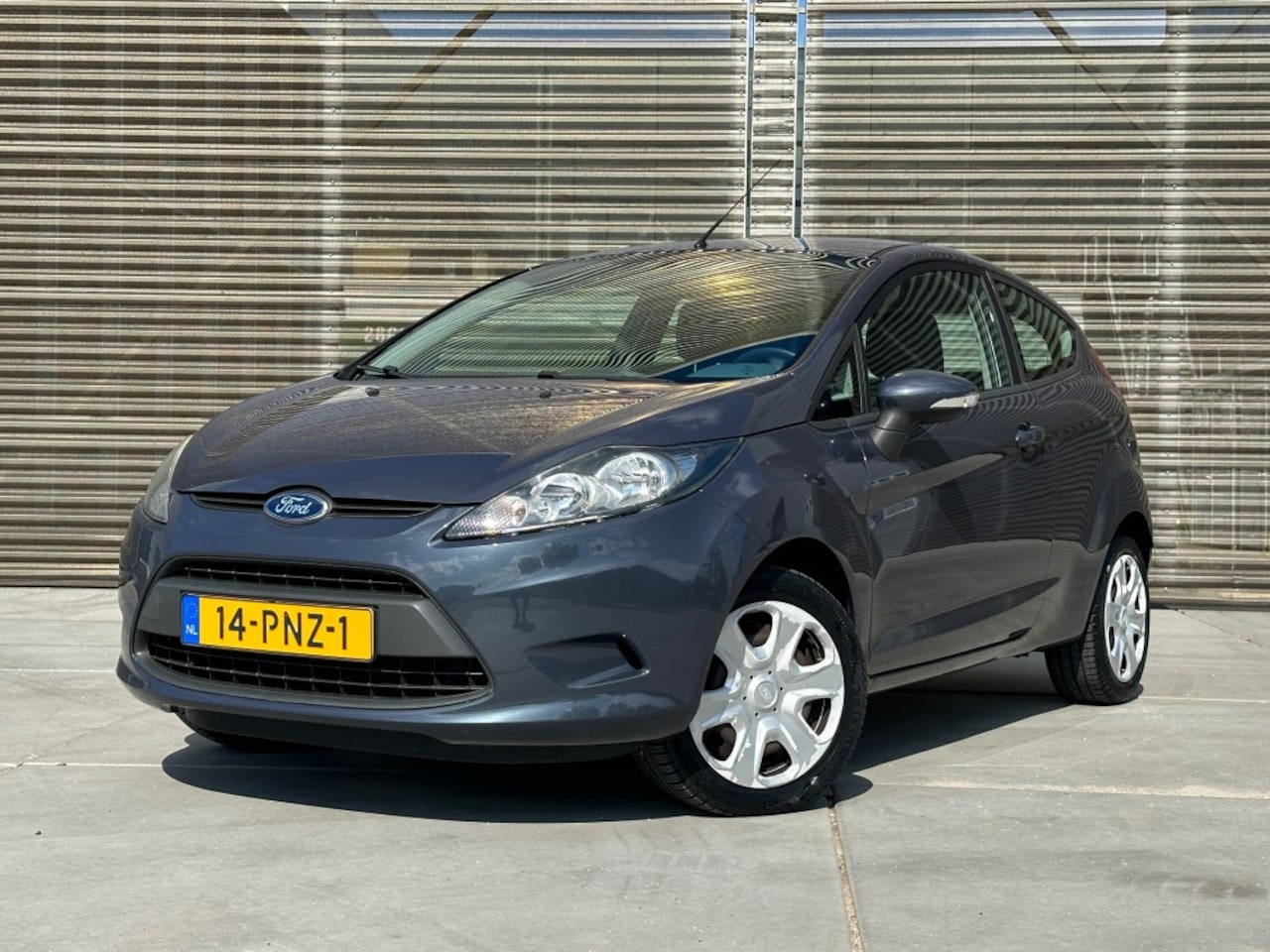 Ford Fiesta - 1.25 LIMITED AIRCO !! LAGE KM !!  APK 1-3-2026 !! - AutoWereld.nl