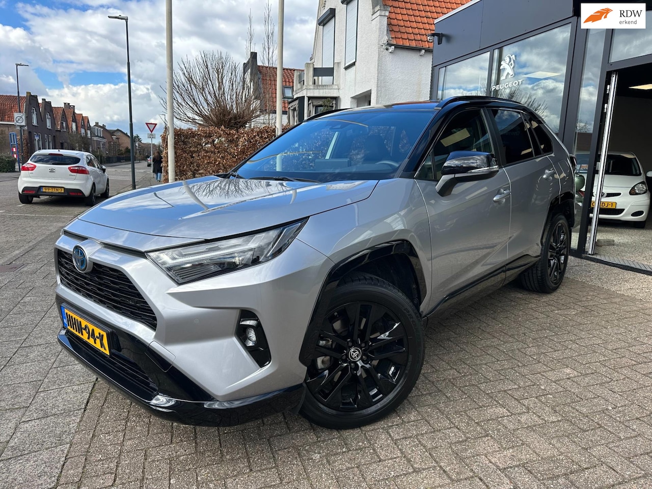 Toyota RAV4 - 2.5 Hybrid Style|Bi-Tone|Face Lift|Lederen Bekleding|19" LM Velgen - AutoWereld.nl