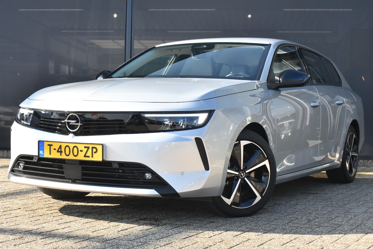 Opel Astra Sports Tourer - 1.6 Turbo Hybrid PHEV 180pk Automaat| Navigatie by App | Parkeersensoren | Climate Control - AutoWereld.nl