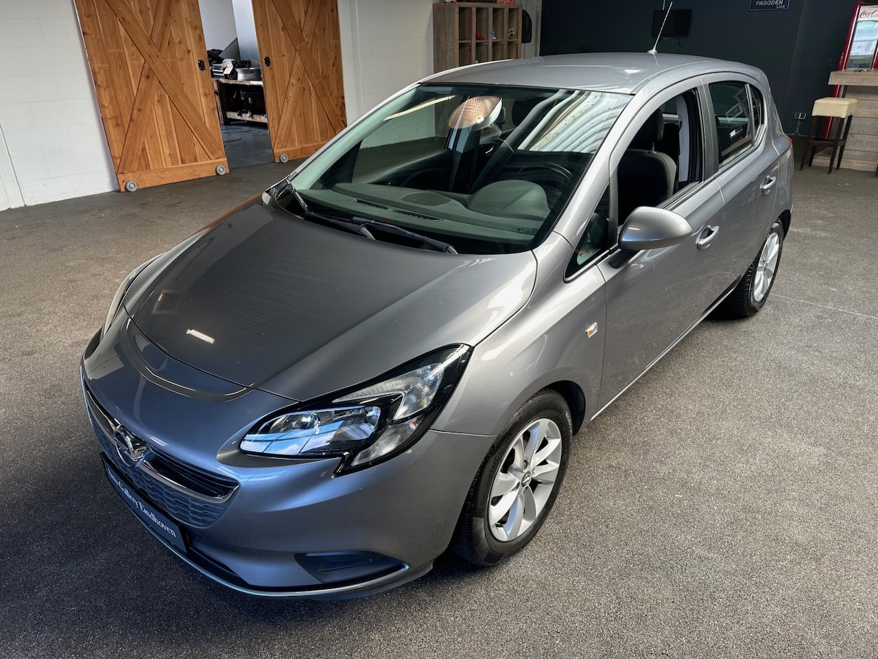 Opel Corsa - 1.4 Edition *5drs*AIRCO*NAVIGATIE*CRUISE-CONTROL*LM-VELGEN*DEALER-ONDERHOUDEN* - AutoWereld.nl