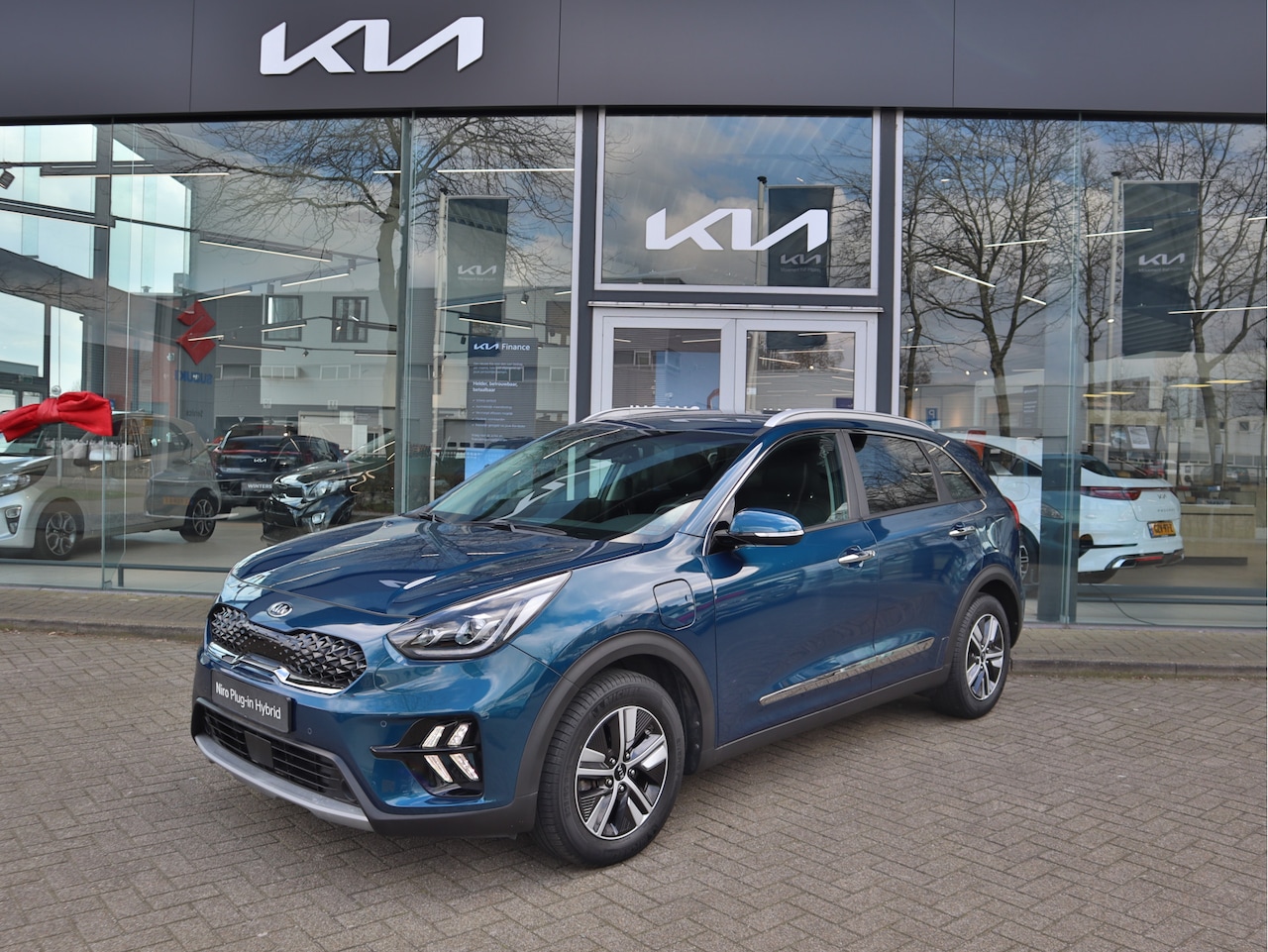 Kia Niro - 1.6 GDi PHEV DynamicPlusLine Navi+BT+Cam ECC-Airco Cr.Control Stoel+Stuurverw.  10jr Garan - AutoWereld.nl