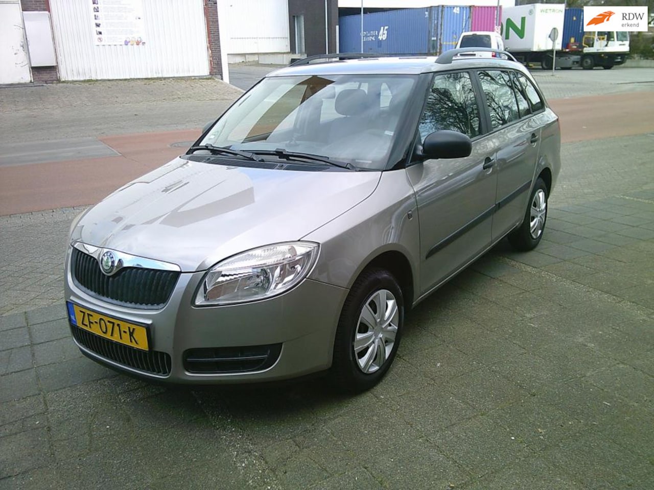 Skoda Fabia Combi - 1.2-12V Ambition Business Line/clima/trekhaak - AutoWereld.nl