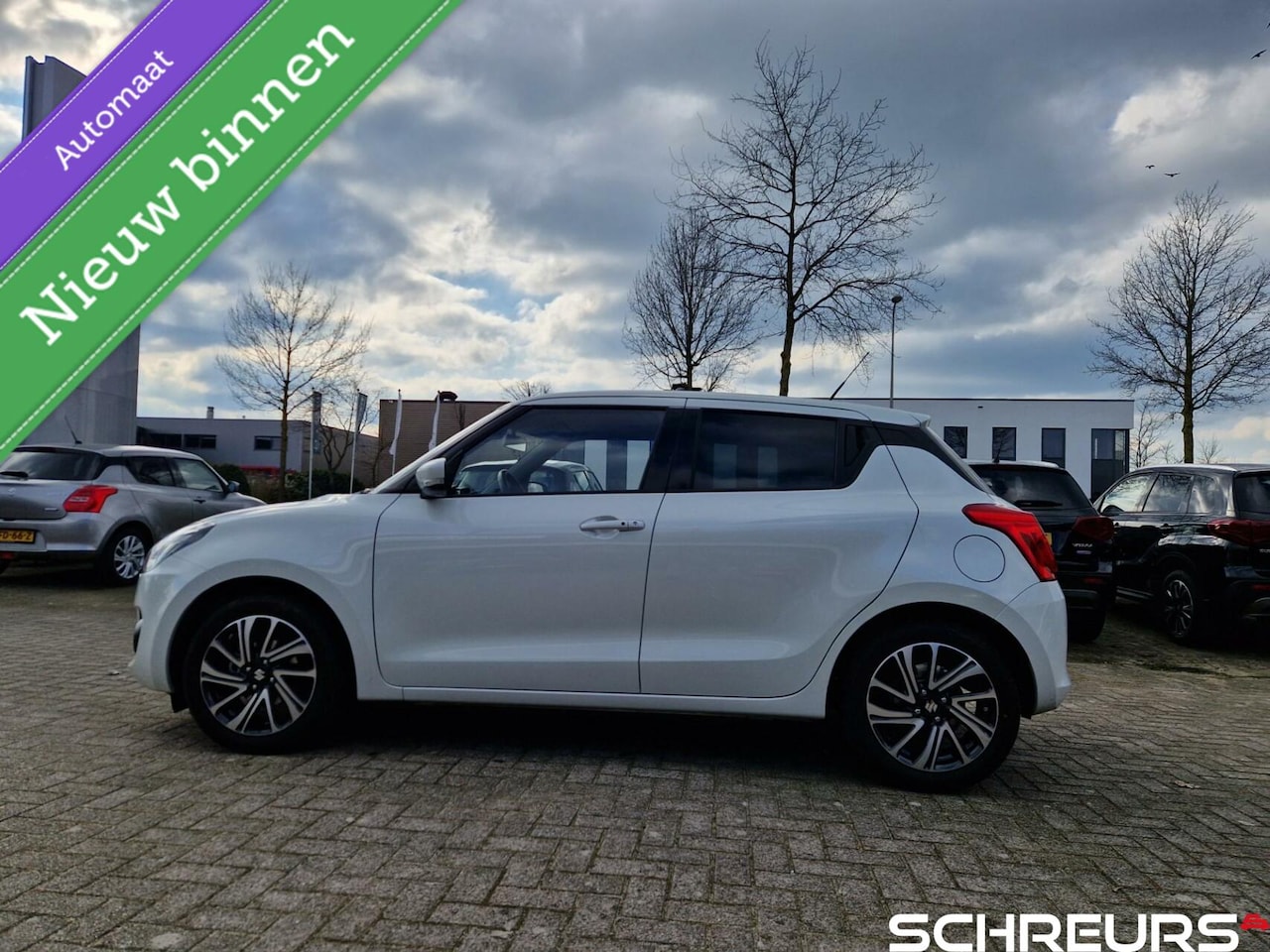 Suzuki Swift - 1.2 Style Smart Hybrid | 1st eigenaar | Trekhaak | Rijklaar prijs | Nog 4 jaar garantie - AutoWereld.nl