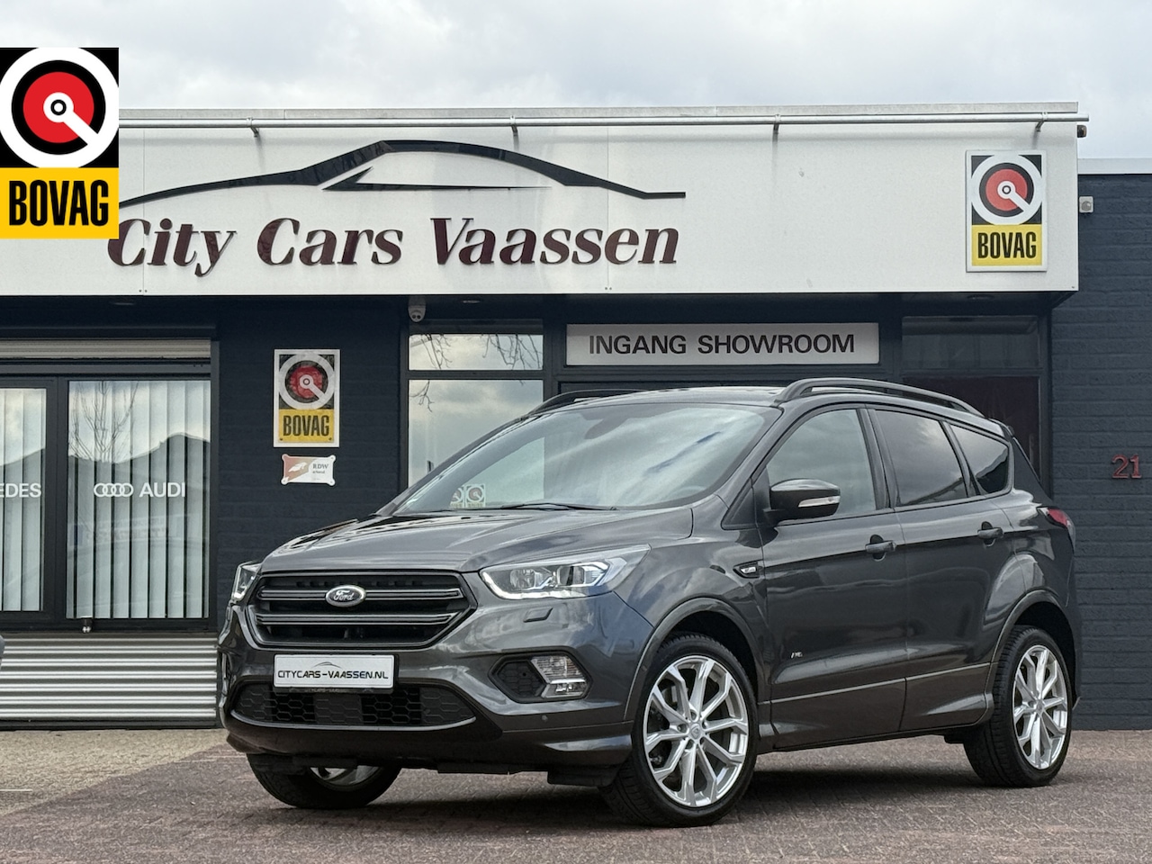 Ford Kuga - 1.5 EcoBoost 4x4 ST Line 176 pk automaat panoramadak navigatie camera full led climate ctr - AutoWereld.nl