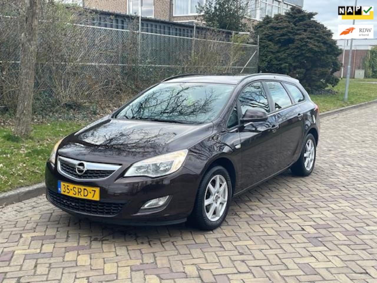 Opel Astra Sports Tourer - 1.4 Edition Airco/ Nap/ Navi - AutoWereld.nl