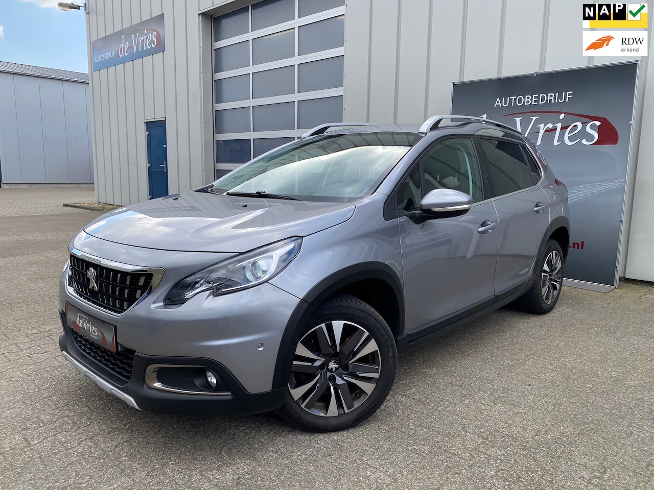 Peugeot 2008 - 1.2 PureTech Allure 130PK Automaat / Clima / Cruise / Navi / Camera / PDC V&A - AutoWereld.nl