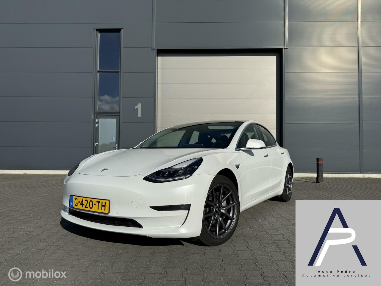 Tesla Model 3 - Long Range RWD Long Range Dual Motor AWD 75 kWh SOH 88% Pearl White Inclusief BTW - AutoWereld.nl