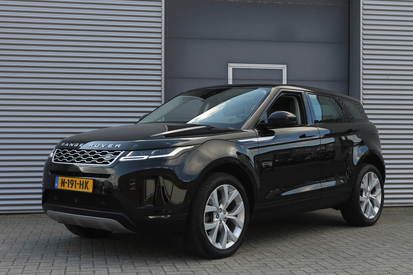 Land Rover Range Rover Evoque - 2.0 P250 AWD SE I AUT. I NAVI I LEDER I PANO.DAK I CARPLAY - AutoWereld.nl