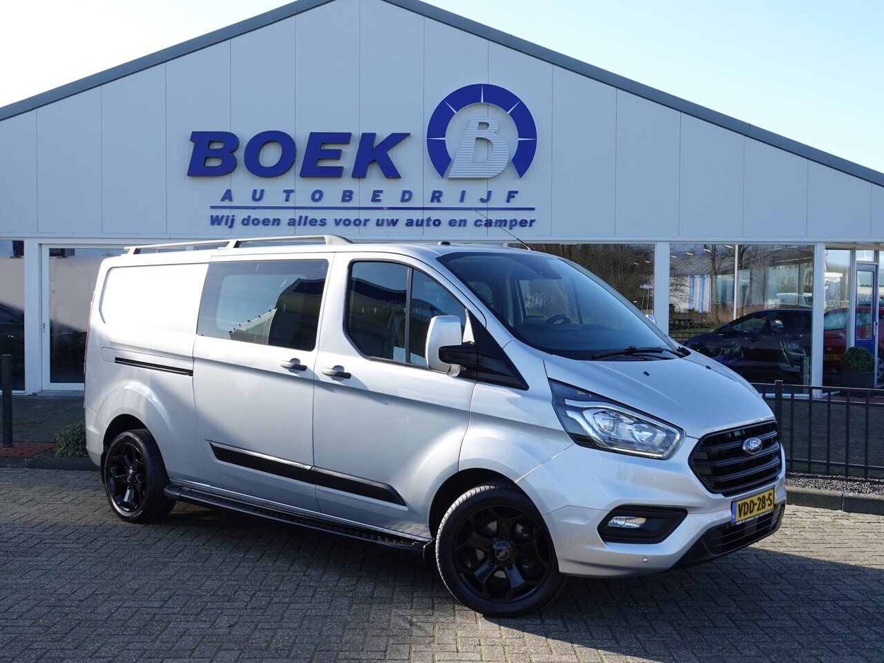 Ford Transit Custom - 320 2.0 TDCI 130PK L2H1 Trend DC 6-PERS NAVI | CRUISE | LMV | AIRCO | PDC - AutoWereld.nl