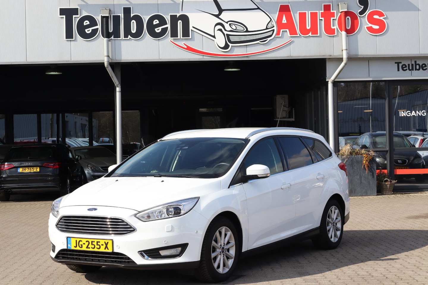 Ford Focus Wagon - 1.5 Titanium Edition voorstoelen- en stuurwiel verwarmbaar, Climate control, Cruise contro - AutoWereld.nl