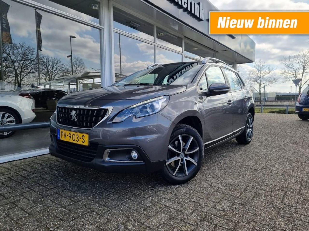 Peugeot 2008 - 1.2 BLUE LION PANO TREKHAAK - AutoWereld.nl