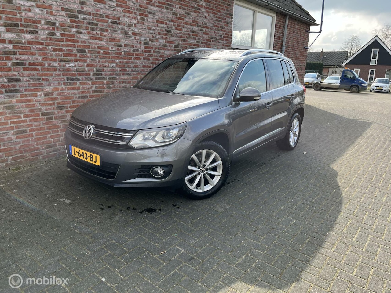 Volkswagen Tiguan - 1.4 TSI Comfort&Design Edition - AutoWereld.nl