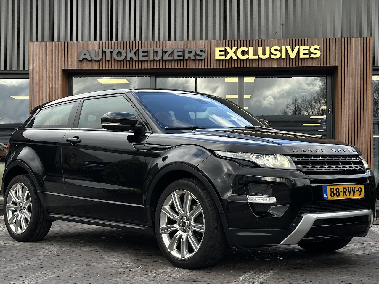 Land Rover Range Rover Evoque Coupé - 2.0 Si 4WD Prestige Dynamic Panoramadak Schaalstoelen Meridian Stuurverw. DAB+ - AutoWereld.nl