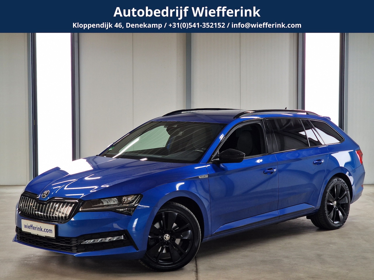 Skoda Superb Combi - 1.4 TSI iV Sportline Business 218pk | ACC | Trekhaak | Camera | Alcantara - AutoWereld.nl