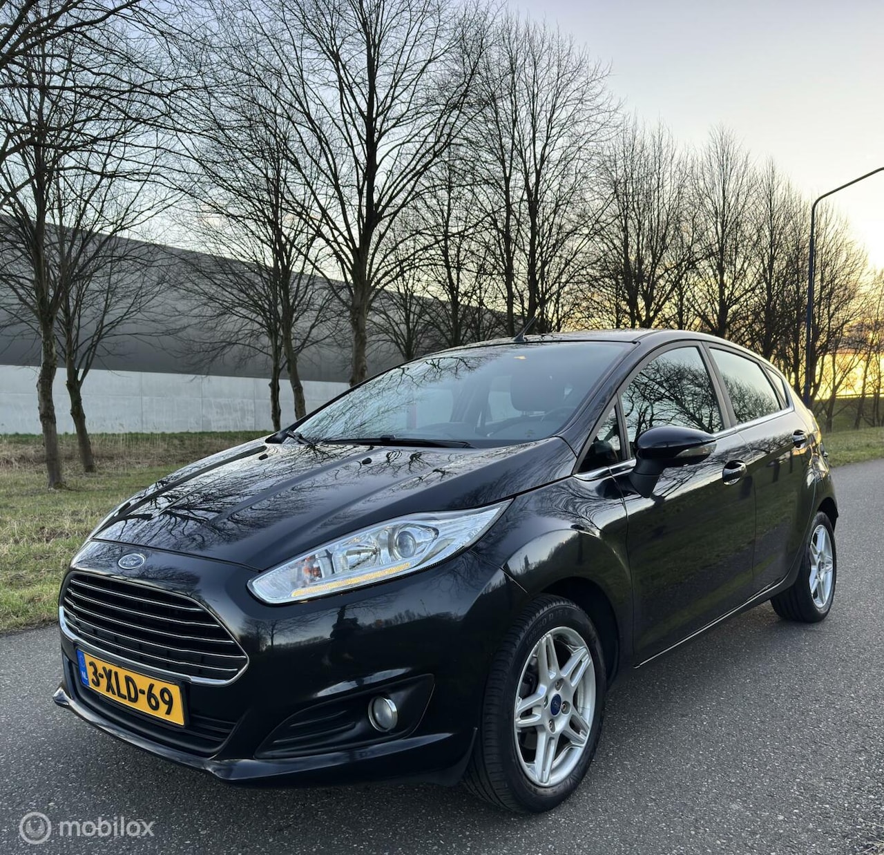 Ford Fiesta - 1.0 EcoBoost Titanium*AUTOMAAT*NAVIGATIE*AIRCO - AutoWereld.nl