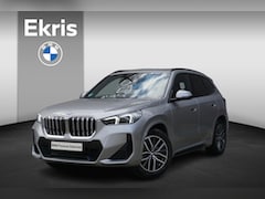 BMW X1 - sDrive18i M Sportpakket | Premium Pack | Travel Pack | Glazen panoramadak | High-beam assi