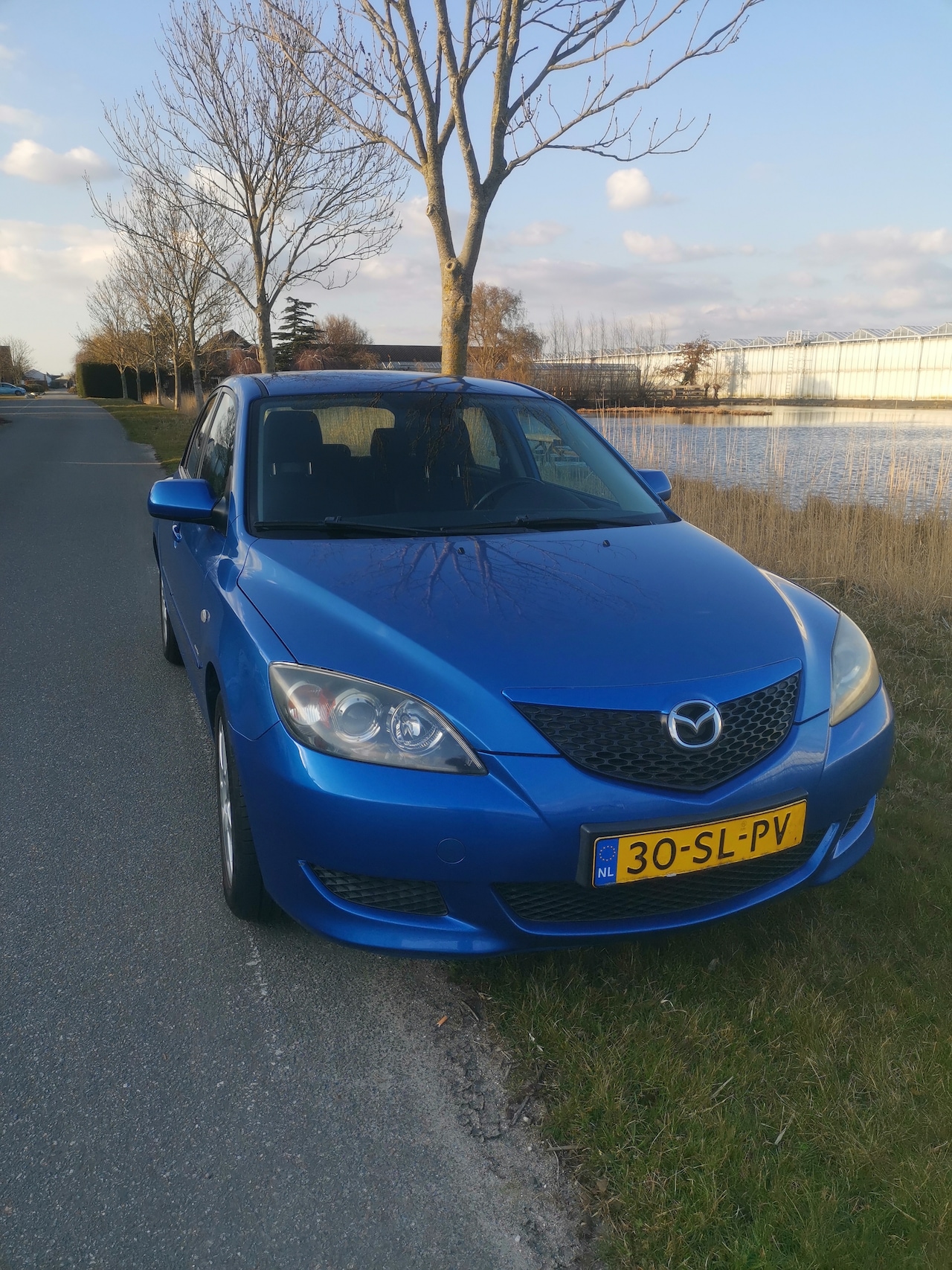 Mazda 3 Sport - 1.6 Touring Afneembare trekhaak - AutoWereld.nl